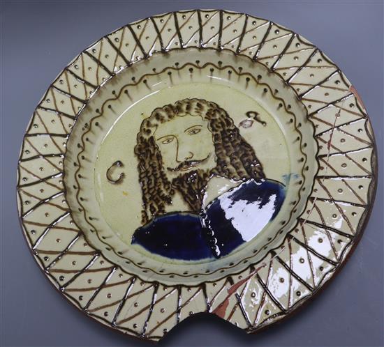 A 19th century slipware portrait dish diameter 42cm - a.f.